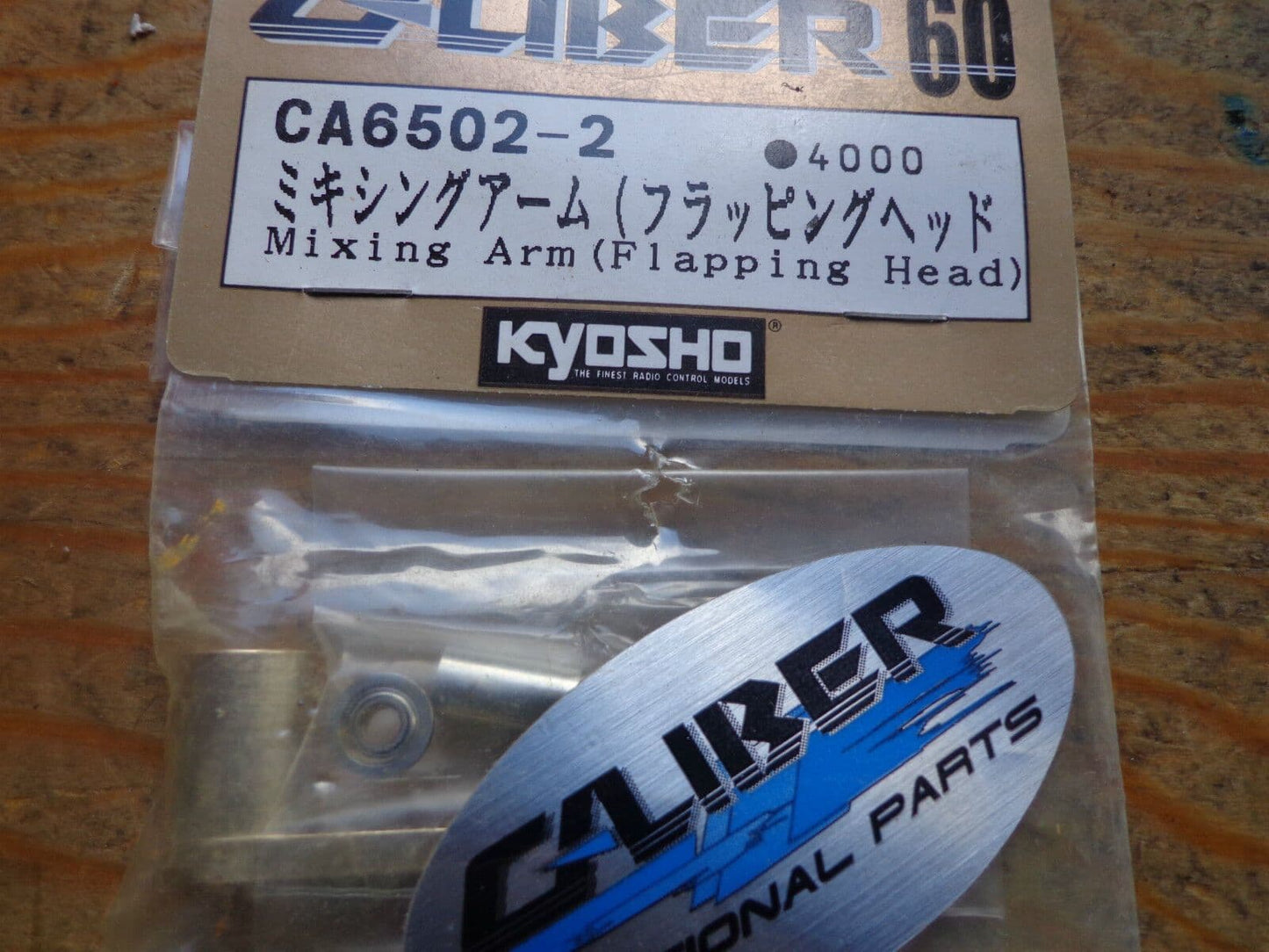 KYOSHO CALIBER 60 MIXING ARM ( FLAPPING HEAD) CA6502-2 BNIB