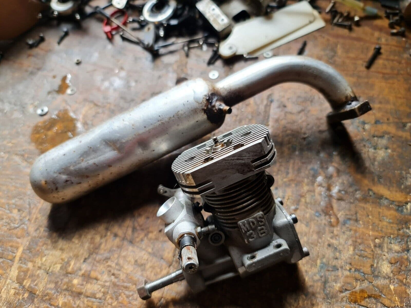 MDS 38H HELI ENGINE & MINI PIPE LIGHTLY OIL STAINED RUNS WELL