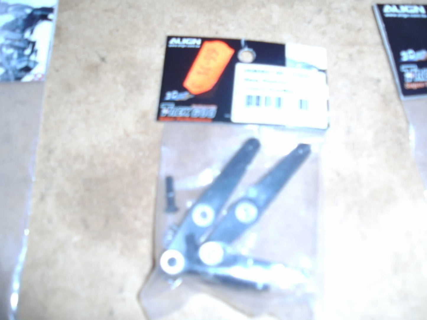 TREX 600 METAL WASHOUT CONTROL ARMS BLACK HN6092T-00 BNIB