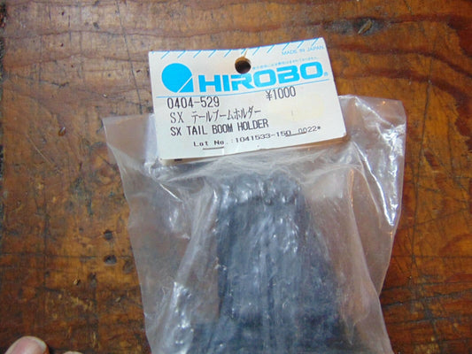 0404-529 SX TAIL BOOM HOLDER  BNIB