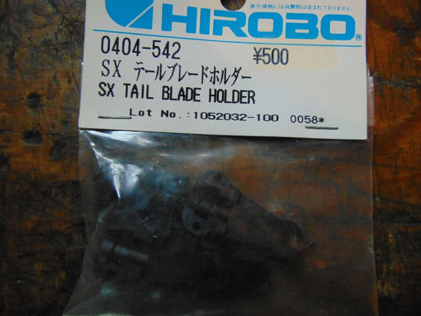 0404-542 SX TAIL BLADE HOLDER  BNIB