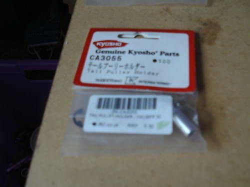 KYOSHO CALIBER TAIL PULLEY HOLDER CA3055 BRAND NEW