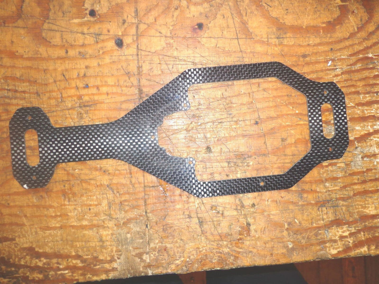 OUTRAGE VELOCITY 50 N2 CARBON FIBRE LOWER MAIN FRAME BRACE  UNUSED