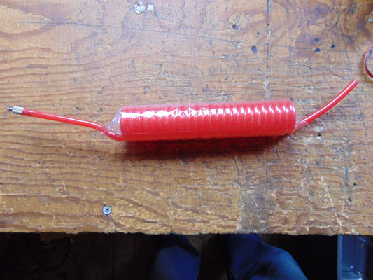 RETRACTABLE COILED FUEL TUBING THOUGHT TO BE 4 FEET LONGISH  BNIB
